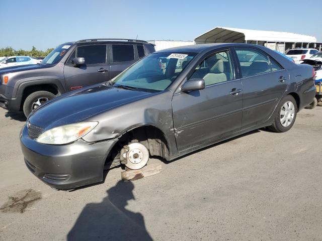 TOYOTA CAMRY LE 2003 with VIN 4T1BE32K93U724479 - Photo from auction