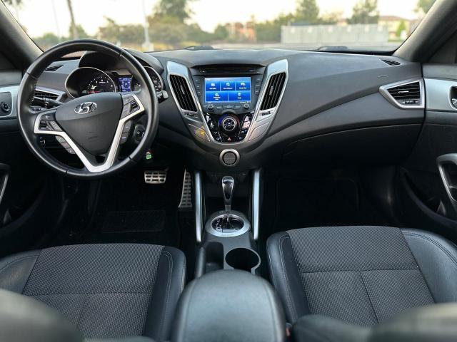 Photo 9 from auction – 2016 HYUNDAI VELOSTER with VIN KMHTC6AD4GU253913
