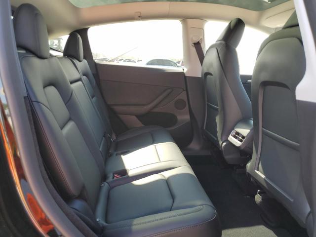 Photo 11 from auction – 2023 TESLA MODEL Y with VIN 7SAYGDEE7PF838955