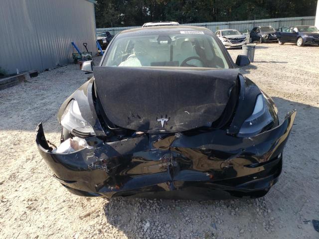 Photo 5 from auction – 2021 TESLA MODEL 3 with VIN 5YJ3E1EA6MF060829