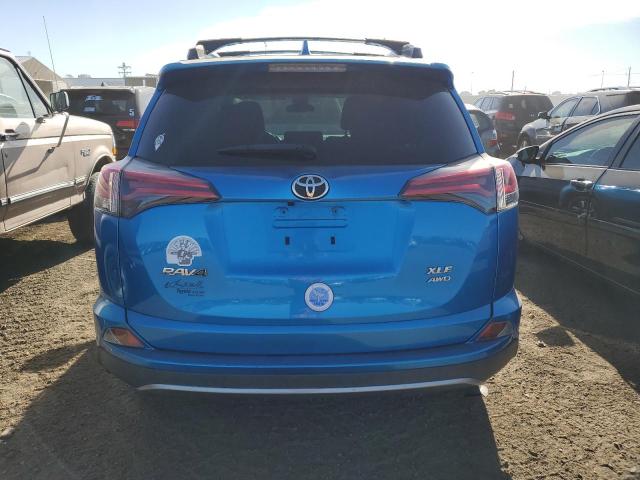 Photo 6 from auction – 2017 TOYOTA RAV4 XLE with VIN JTMRFREV7HD221646
