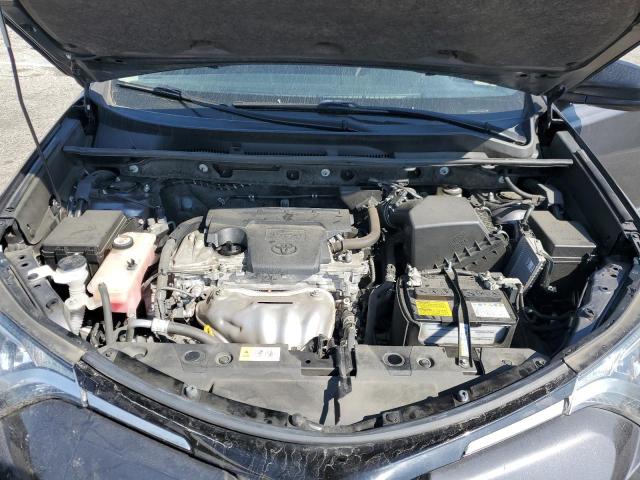Photo 12 from auction – 2018 TOYOTA RAV4 LE with VIN JTMZFREV5JJ155461