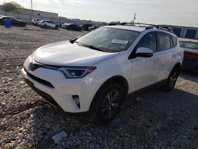 TOYOTA RAV4 XLE 2017 with VIN JTMWFREV2HJ134340 - Photo from auction