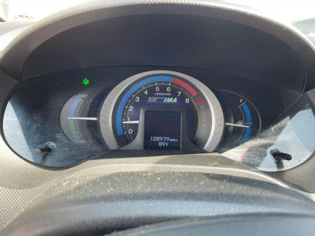 Photo 8 from auction – 2011 HONDA INSIGHT LX with VIN JHMZE2H59BS006678