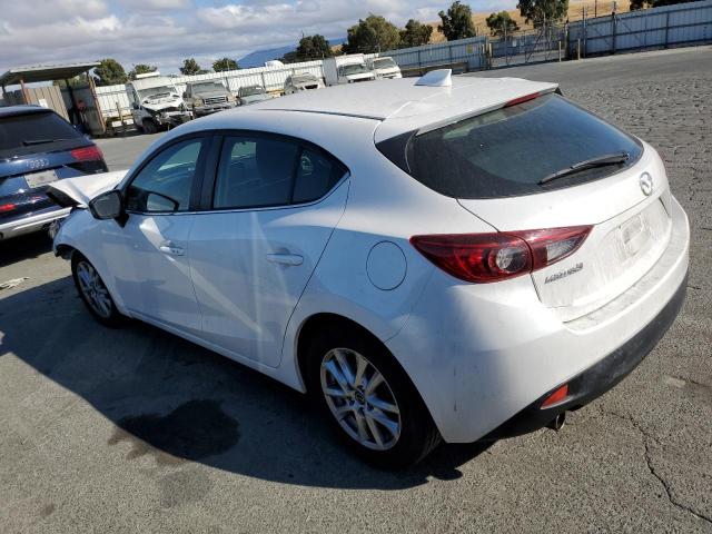 Photo 2 from auction – 2015 MAZDA 3 TOURING with VIN 3MZBM1L71FM157809