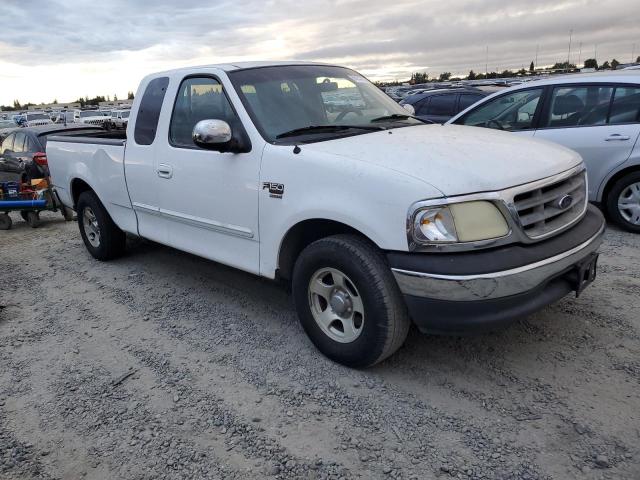 Photo 4 from auction – 2000 FORD F150 with VIN 1FTRX17L5YKA65502