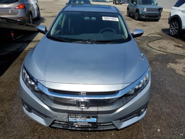 Photo 5 from auction – 2018 HONDA CIVIC EX with VIN JHMFC1F33JX036717