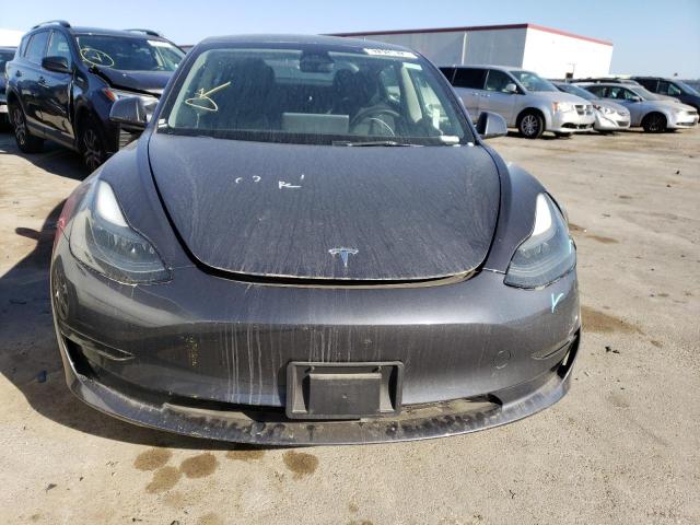 Photo 5 from auction – 2023 TESLA MODEL 3 with VIN 5YJ3E1EA3PF448038