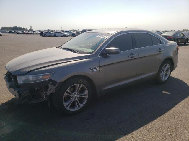 FORD TAURUS SEL 2014 with VIN 1FAHP2E87EG178310 - Photo from auction