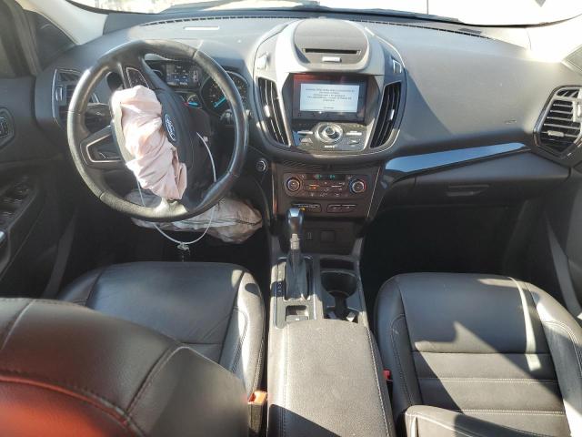 Photo 8 from auction – 2017 FORD ESCAPE TIT with VIN 1FMCU9J98HUA63642
