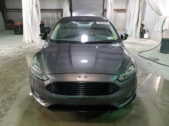 Снимка 5 от търг – 2017 FORD FOCUS SE с VIN 1FADP3FE0HL253059