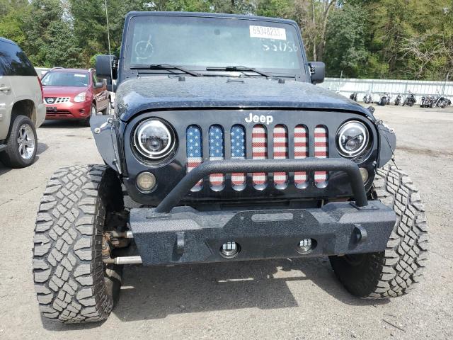 Photo 5 from auction – 2011 JEEP WRANGLER U with VIN 1J4BA6H10BL551756