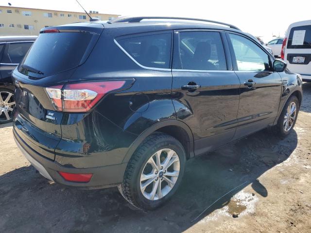 Photo 3 from auction – 2018 FORD ESCAPE SE with VIN 1FMCU9GD2JUA26345