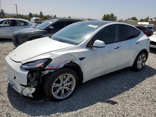 TESLA MODEL Y 2021 with VIN 5YJYGAEE3MF302222 - Photo from auction