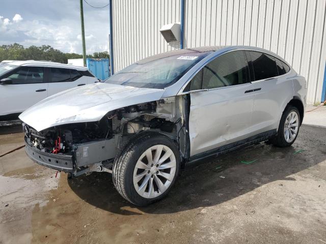 TESLA MODEL X 2018 with VIN 5YJXCDE26JF089907 - Photo from auction