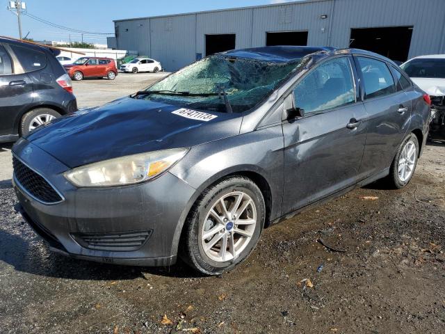 FORD FOCUS SE 2017 with VIN 1FADP3F2XHL304816 - Photo from auction
