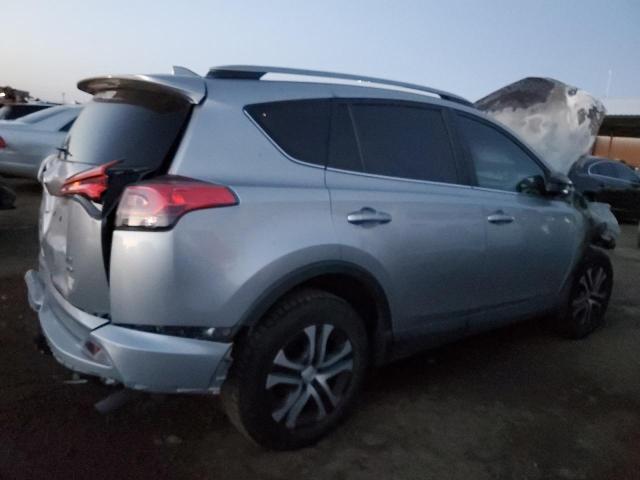 Photo 3 from auction – 2017 TOYOTA RAV4 LE with VIN 2T3BFREV0HW564383