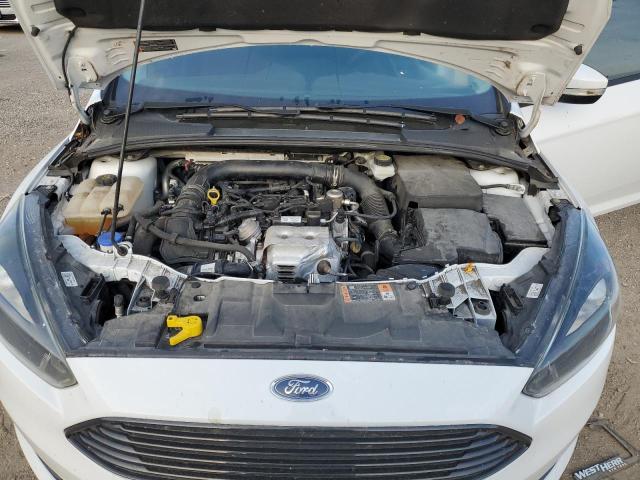 Photo 11 from auction – 2017 FORD FOCUS SE with VIN 1FADP3FE3HL284466