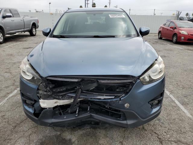 Photo 5 from auction – 2016 MAZDA CX-5 TOURI with VIN JM3KE2CY0G0737613