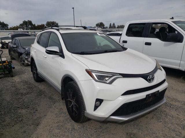 Photo 4 from auction – 2016 TOYOTA RAV4 SE with VIN JTMJFREV3GD175678