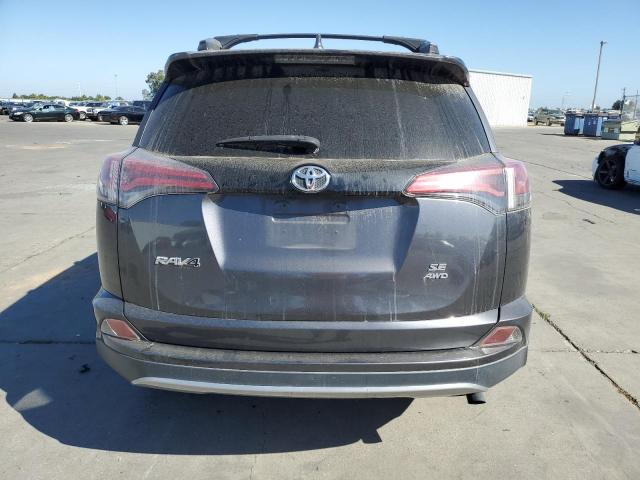 Photo 6 from auction – 2018 TOYOTA RAV4 SE with VIN JTMJFREV2JD243315