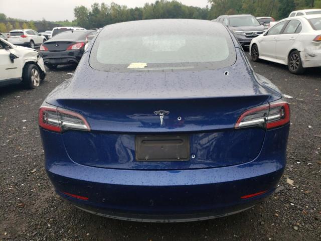 Снимка 6 от търг – 2022 TESLA MODEL 3 с VIN 5YJ3E1EAXNF184992