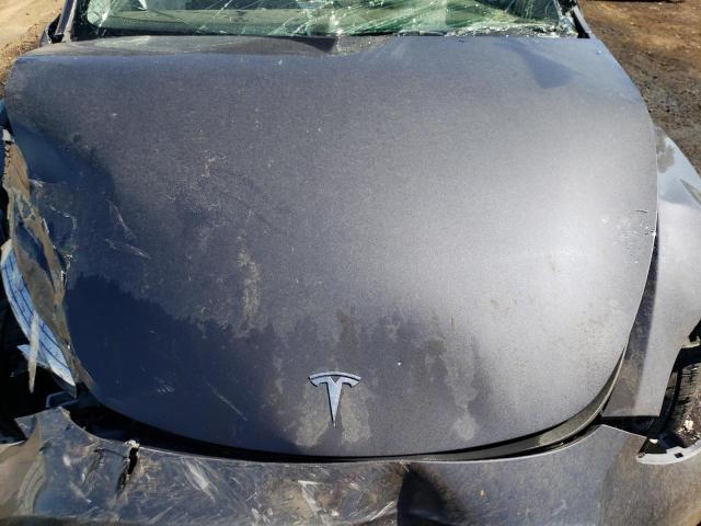 Photo 11 from auction – 2022 TESLA MODEL Y with VIN 7SAYGDEEXNF494390