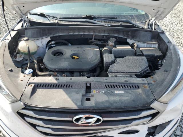 Photo 12 from auction – 2017 HYUNDAI TUCSON SE with VIN KM8J2CA46HU484032