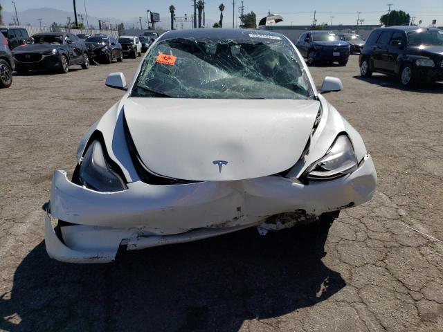 Photo 5 from auction – 2022 TESLA MODEL 3 with VIN 5YJ3E1EA9NF143236