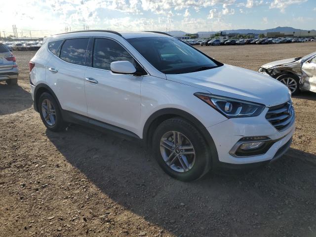 Photo 4 from auction – 2017 HYUNDAI SANTA FE S with VIN 5NMZU3LB5HH013722