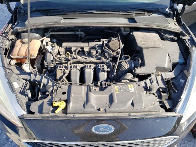 Photo 11 from auction – 2016 FORD FOCUS SE with VIN 1FADP3F22GL286455