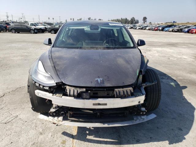 Photo 5 from auction – 2021 TESLA MODEL 3 with VIN 5YJ3E1EAXMF878211