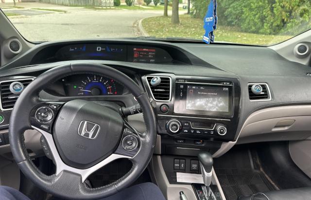 Photo 9 from auction – 2014 HONDA CIVIC LX with VIN 2HGFB2F57EH002559