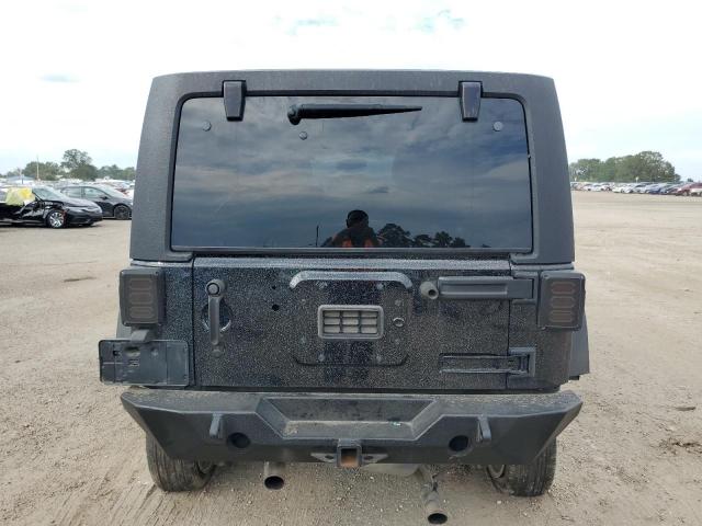 Photo 6 from auction – 2016 JEEP WRANGLER U with VIN 1C4BJWDG0GL182808