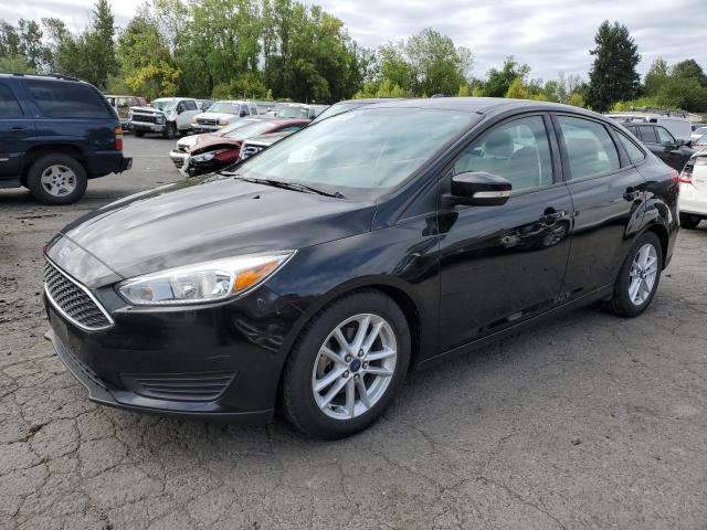 FORD FOCUS SE 2015 with VIN 1FADP3F28FL257069 - Photo from auction