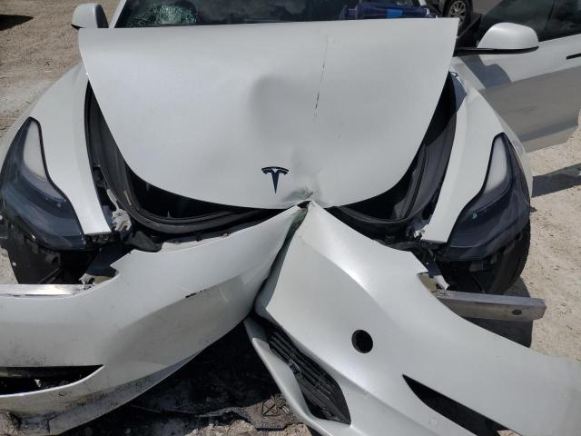 Photo 11 from auction – 2022 TESLA MODEL 3 with VIN 5YJ3E1EBXNF271073