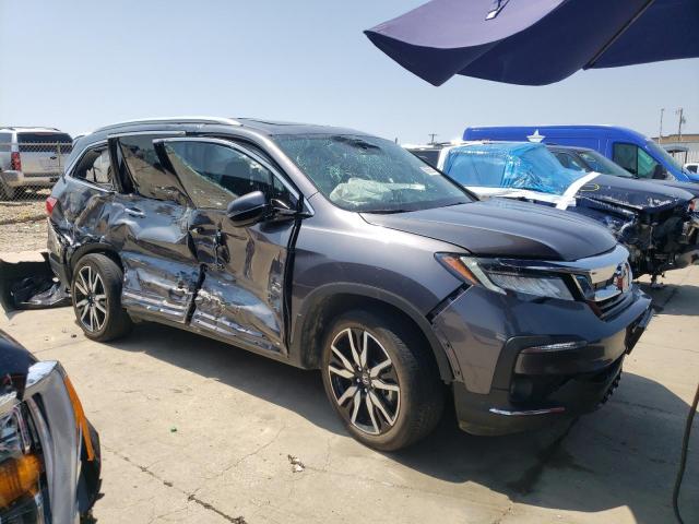 Photo 4 from auction – 2019 HONDA PILOT TOUR with VIN 5FNYF5H90KB009383