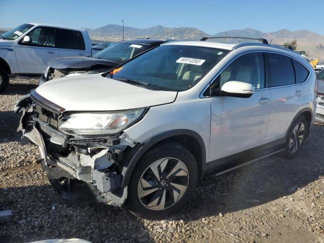 HONDA CR-V TOURI 2016 with VIN 5J6RM4H93GL130217 - Photo from auction