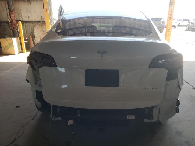 Photo 6 from auction – 2023 TESLA MODEL Y with VIN 7SAYGAEEXPF671165