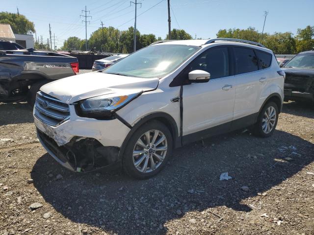 FORD ESCAPE TIT 2017 with VIN 1FMCU9JD4HUC75846 - Photo from auction