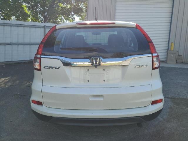 Photo 6 from auction – 2015 HONDA CR-V LX with VIN 5J6RM4H39FL021481
