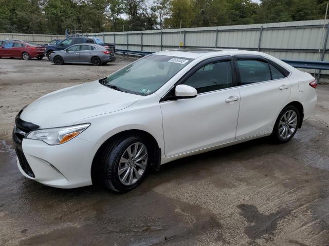 TOYOTA CAMRY LE 2017 with VIN 4T1BF1FKXHU667308 - Photo from auction