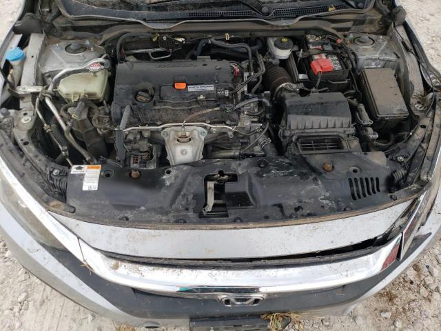 Photo 11 from auction – 2018 HONDA CIVIC LX with VIN 19XFC2F57JE037801