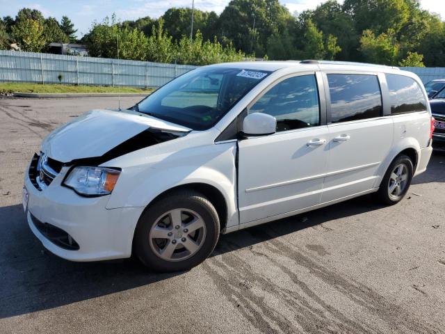 DODGE CARAVAN 2011 with VIN 2D4RN5DG8BR661462 - Photo from auction