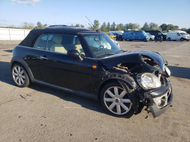 Photo 4 from auction – 2009 MINI COOPER with VIN WMWMR33559TJ94212