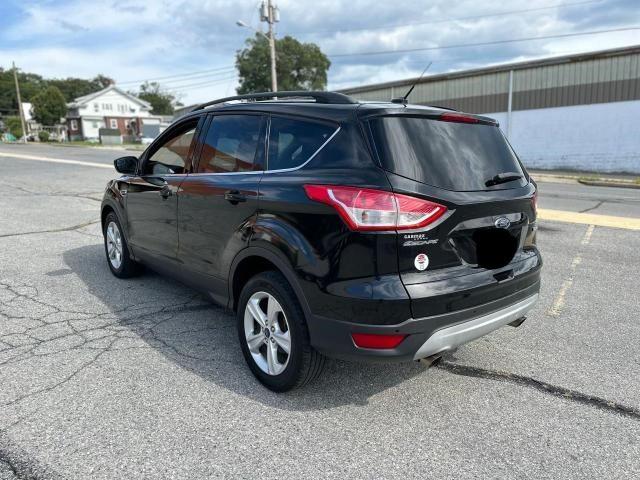 Photo 3 from auction – 2014 FORD ESCAPE SE with VIN 1FMCU0GX3EUC06056