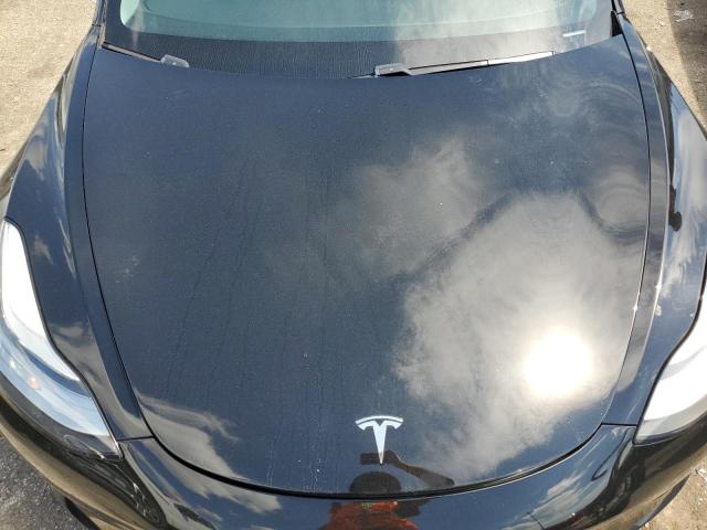 Photo 11 from auction – 2019 TESLA MODEL 3 with VIN 5YJ3E1EA7KF316988