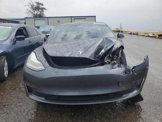 Photo 5 from auction – 2018 TESLA MODEL 3 with VIN 5YJ3E1EB5JF073205