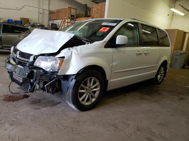 DODGE GRAND CARA 2015 with VIN 2C4RDGCG0FR641614 - Photo from auction