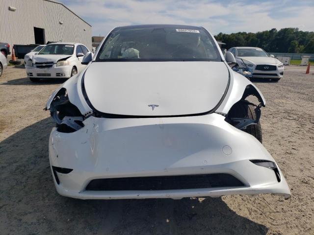 Photo 5 from auction – 2021 TESLA MODEL Y with VIN 5YJYGDED0MF106991